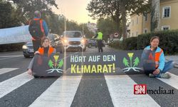 İklim aktivistleri Hall'da trafiğin durmasına neden oldu